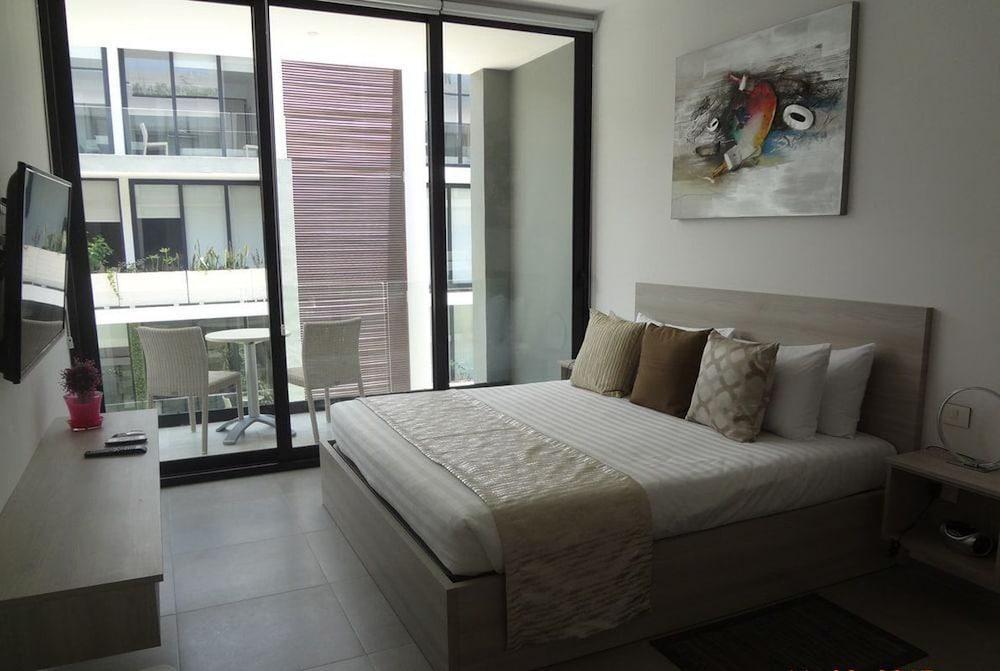 The City Luxury Suites Плая-дель-Кармен Экстерьер фото
